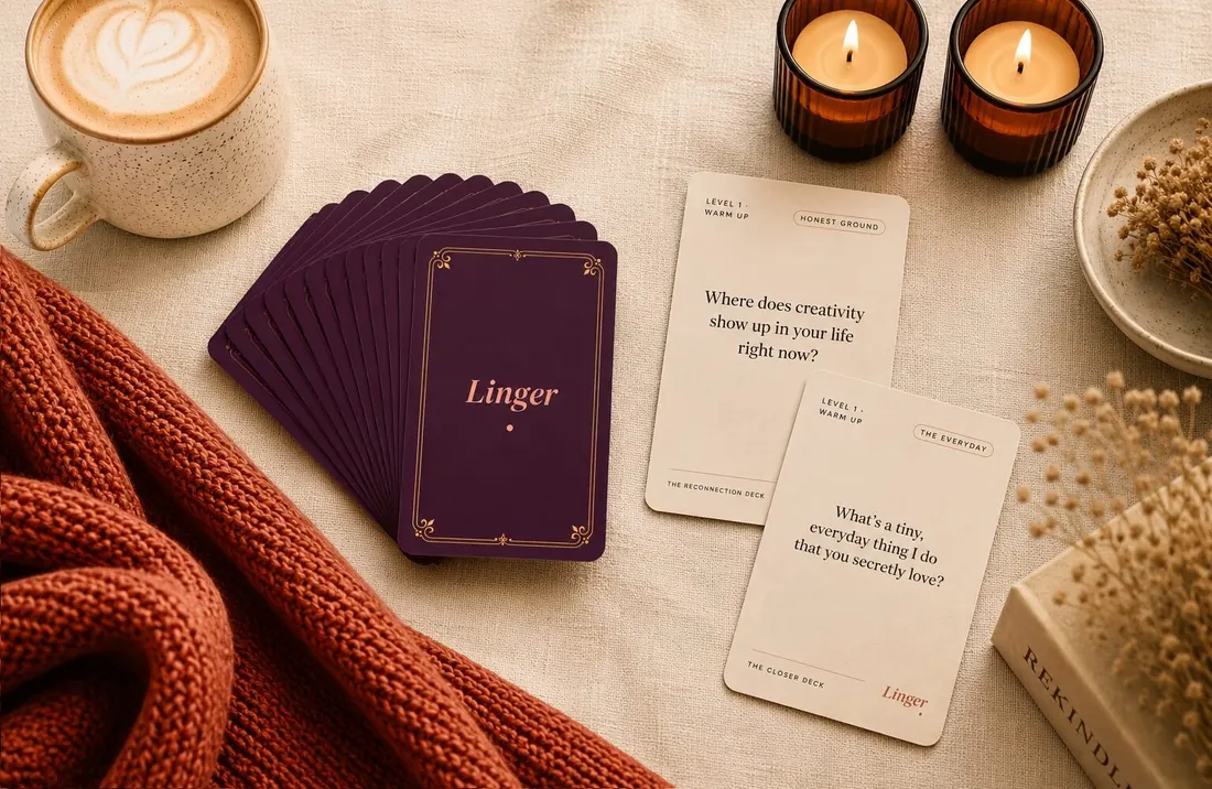 Linger conversation cards fanned out beside a latte and candles